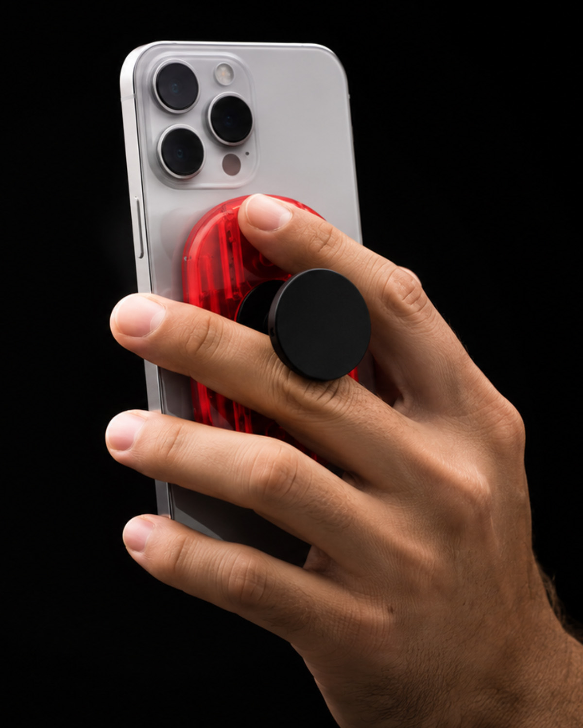 MagAid grip deployed on the back of a phone